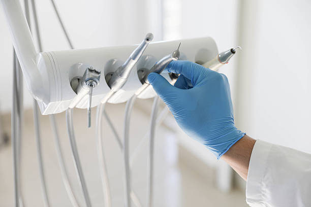 Professional Tooth Extraction technician working in Oklahoma, PA